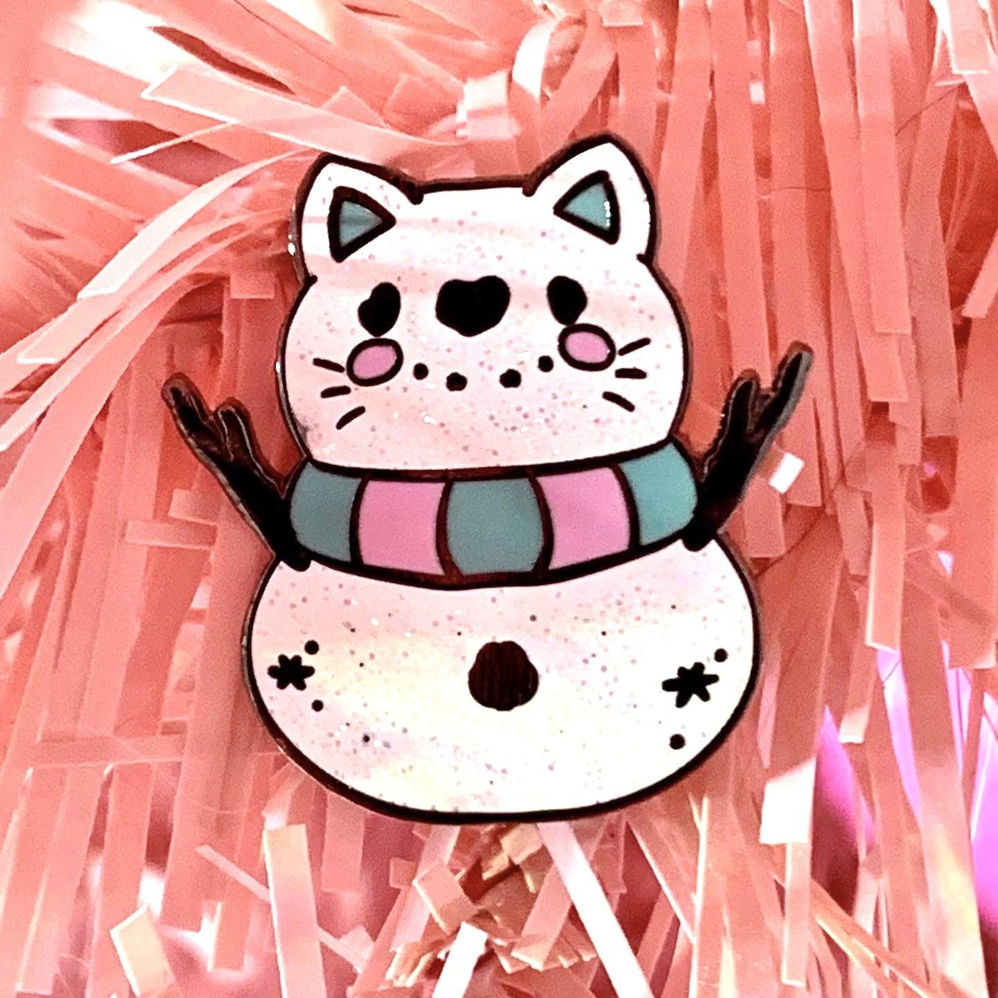 Snow kitty Pin Pin Ash Evans
