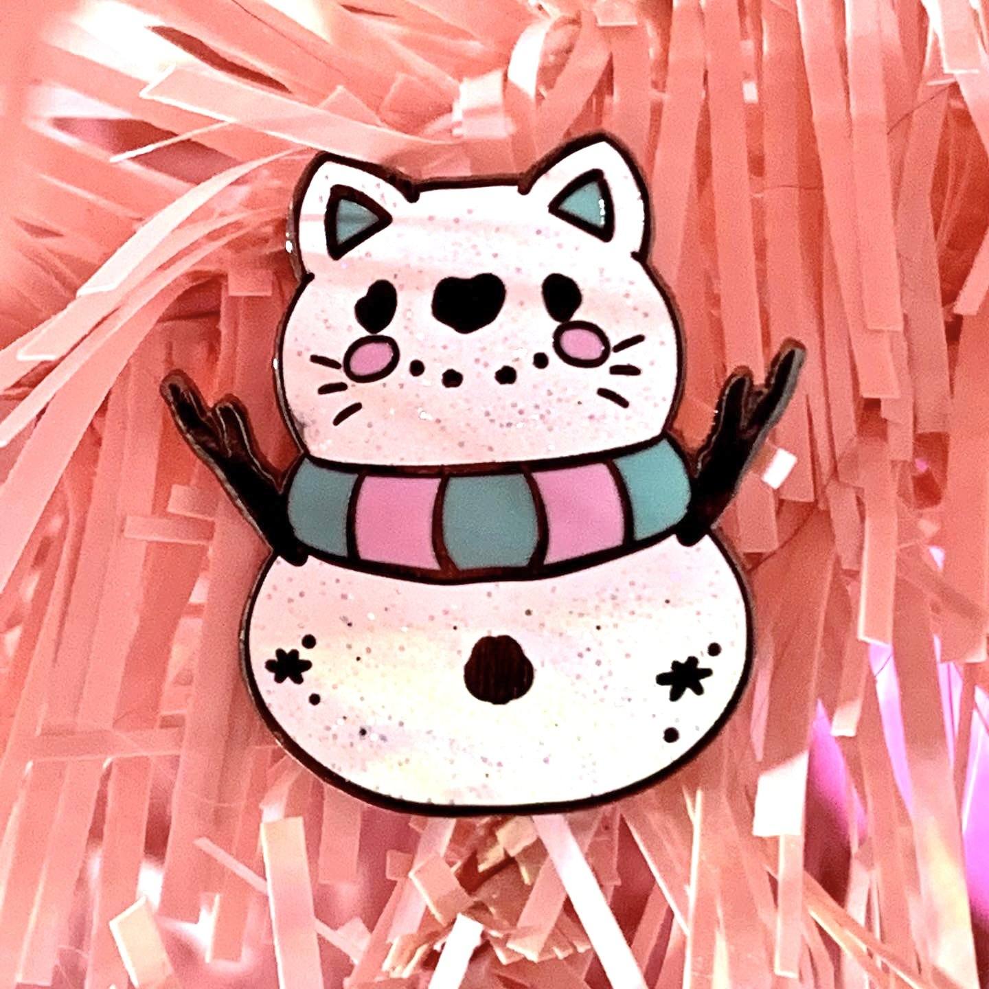 Snow kitty Pin Pin Ash Evans 